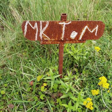 TOM M.K.