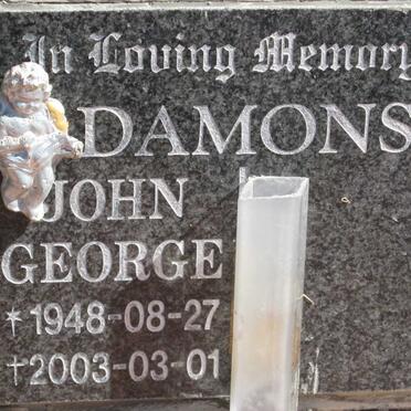 DAMOS John George 1948-2003