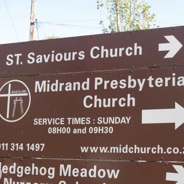 1. ST. SAVIOURS CHURCH road sign